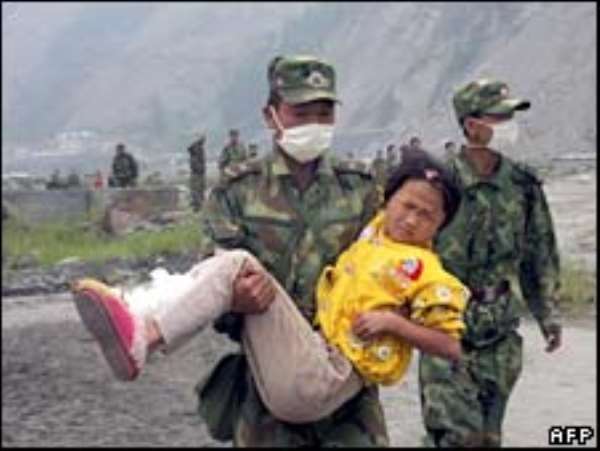 More than 10,000 people are believe to be trapped in rubble